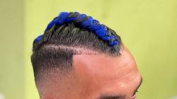 Carlos Tevez tái xuất với mái tóc không đụng hàng